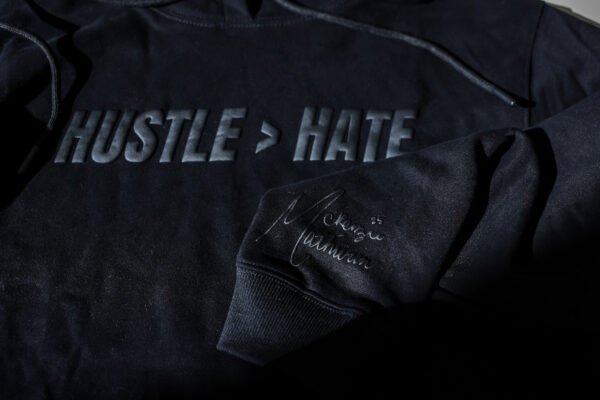 HUSTLE > HATE HOODIE - BLACK (MCKENZIE MATHURIN COLLECTION) - Image 3