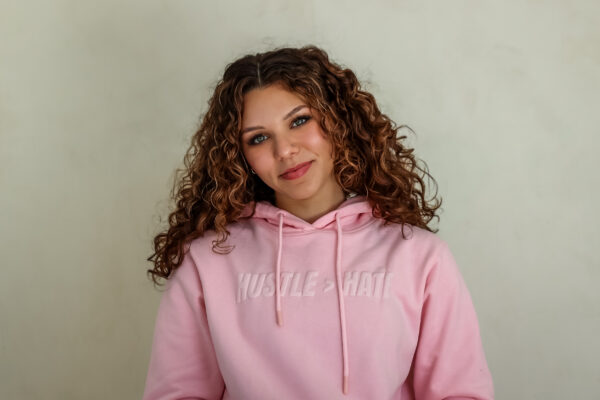 HUSTLE > HATE HOODIE - PINK (MCKENZIE MATHURIN COLLECTION) - Image 2